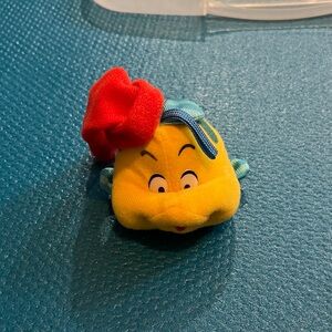 Yellow Plush Toy with Red Hat